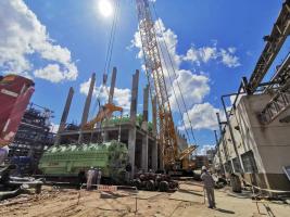 乘风破浪,寰球东北工程总承包大庆炼化公司结构调整增产石蜡项目12台真空转鼓过滤机圆满吊装成功